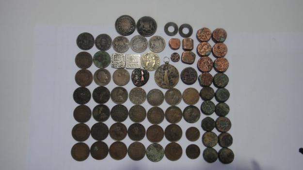 Ancient Old Coins Hold Contemporary Currency