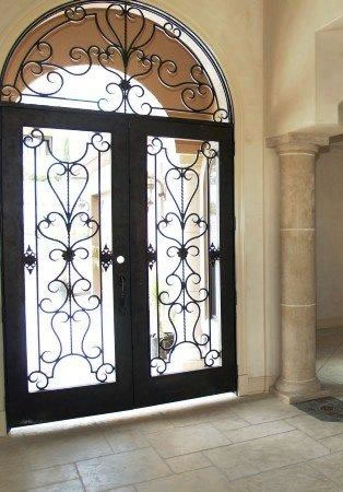 Design And Durability: The Benefits Of Wrought Iron Doors And Gates