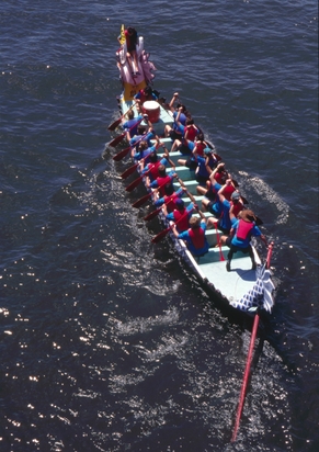 Dragon Boat Vessels Cut Straight Through The Waters Of Culture